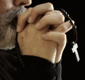 rezando el rosario (ft img)